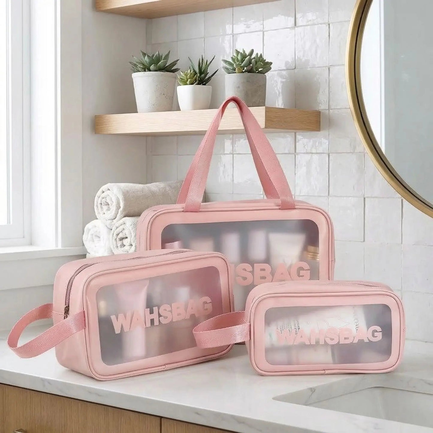 Trois trousses de toilette voyage rose en pvc