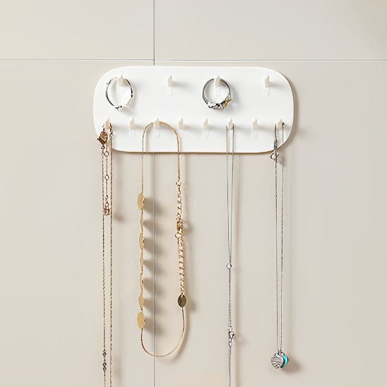 porte bijoux mural blanc pour coller sur un mur