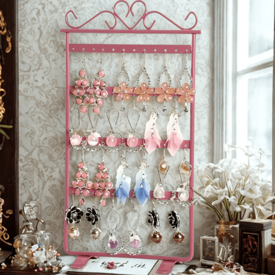 porte boucle d'oreille rose