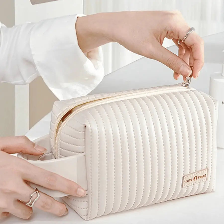Trousse à maquillage blanc avec fermeture éclair