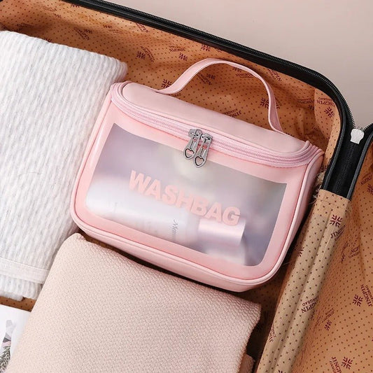 trousse de toilette femme rose transparent valise