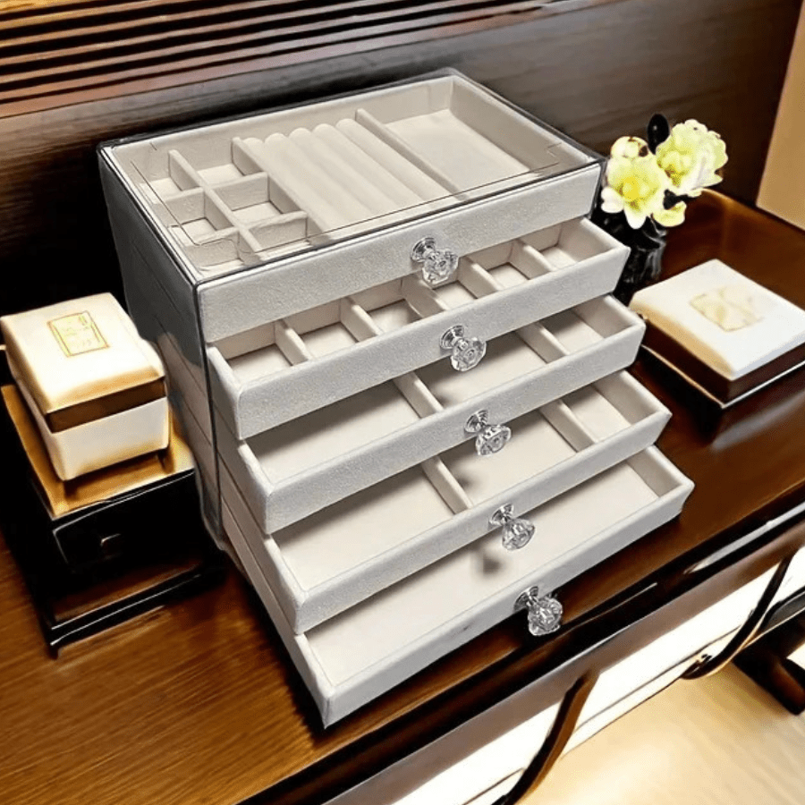 Boite à bijoux transparent tiroir velours sur bureau