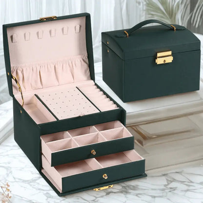Boite à bijoux vert avec deux tiroirs avec serrure