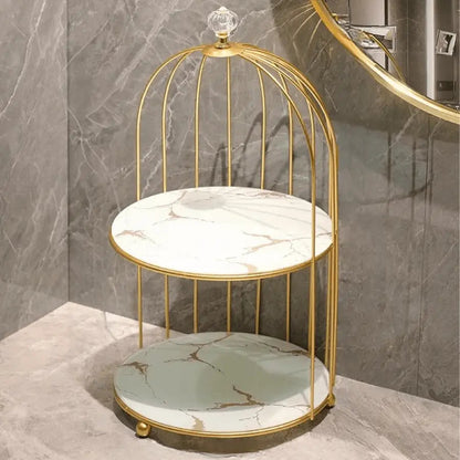 organisateur de maquillage blanc et or en forme de cage oiseaux