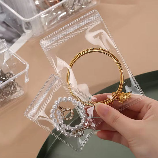 pochette à bijoux grande et petite