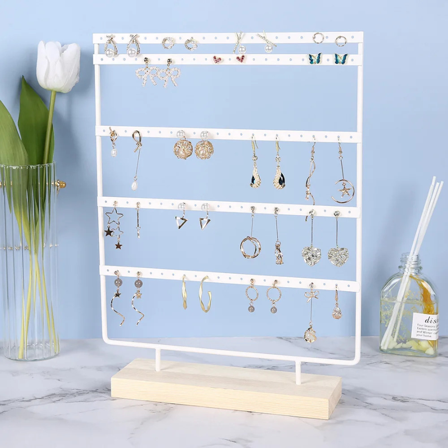 porte boucle d'oreille blanc avec base en bois