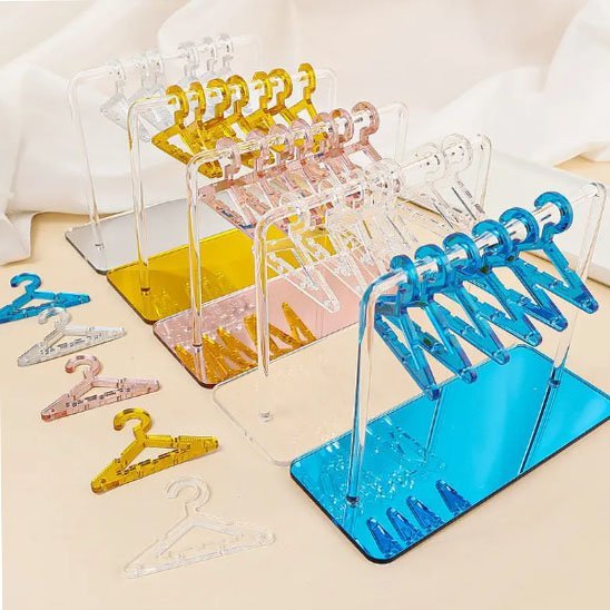Rangement pour bijoux rose bleu jaune et transparent