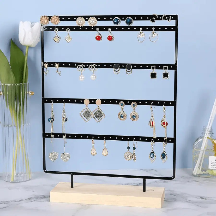 porte boucle d'oreille noir  avec base de bois