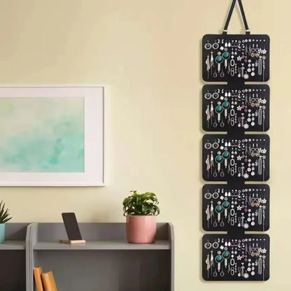 présentoir boucles d'oreilles au mur