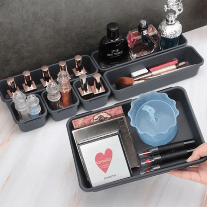 Rangement maquillage gris foncé plastique