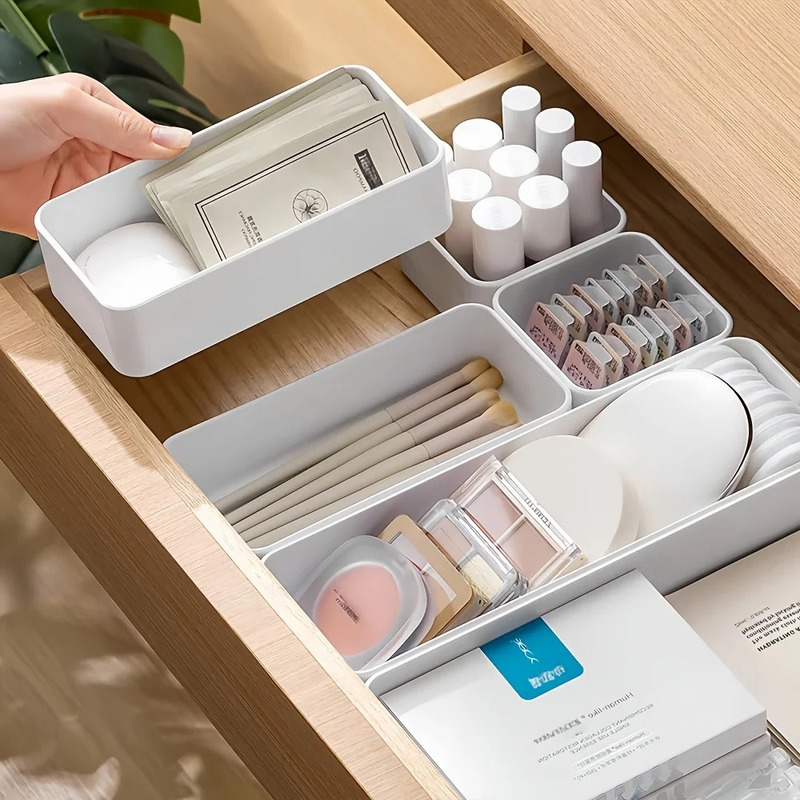 rangement pour tiroir maquillage blanc en plastique avec produits