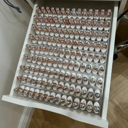 rangement pour vernis à ongles dans un tiroir