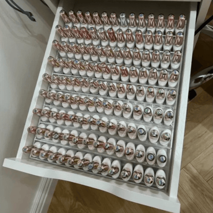 rangement pour vernis à ongles dans un tiroir