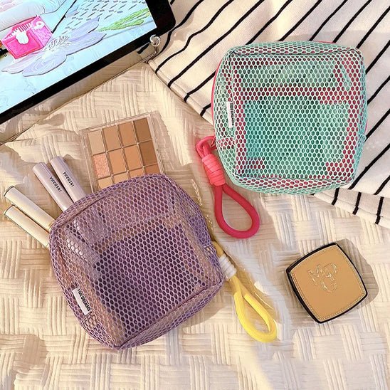 Trousse a maquillage maille transparent vert et violet