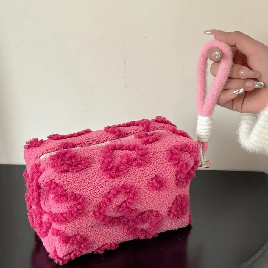 trousse à maquillage rose foncé en peluche