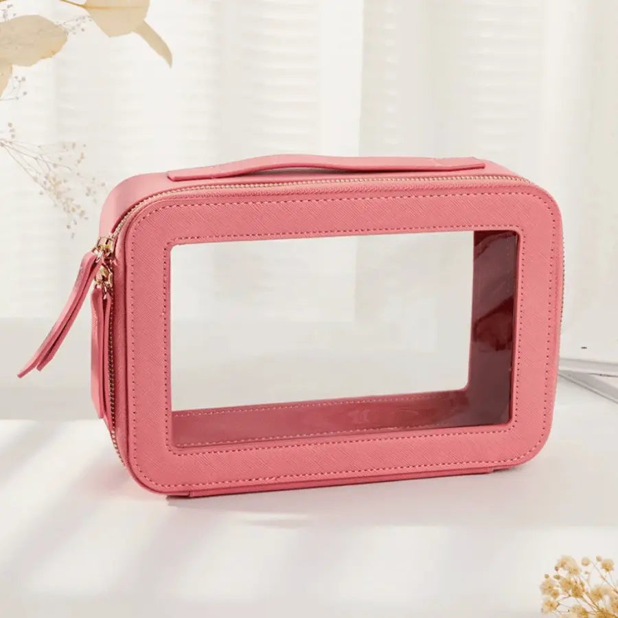 trousse à maquillage transparente rose