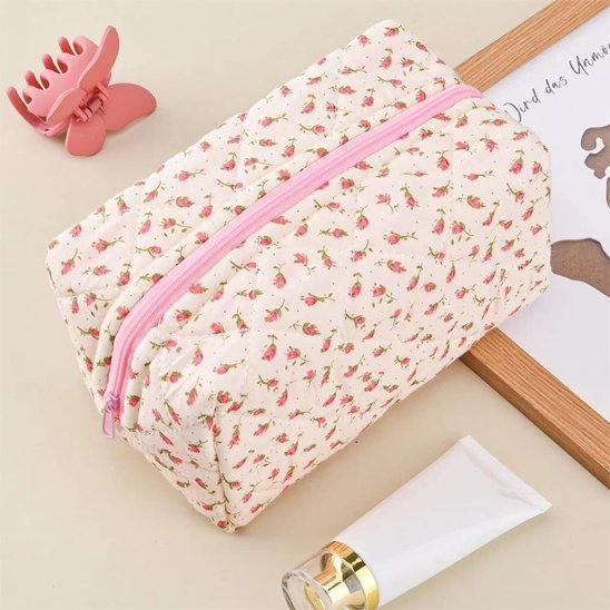 Trousse à maquillage avec fermeture éclair rosé