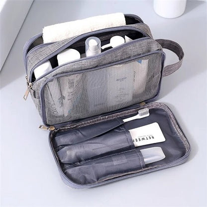 Trousse de toilette avion Compact grise en maille intérieure - La trousse Beauté