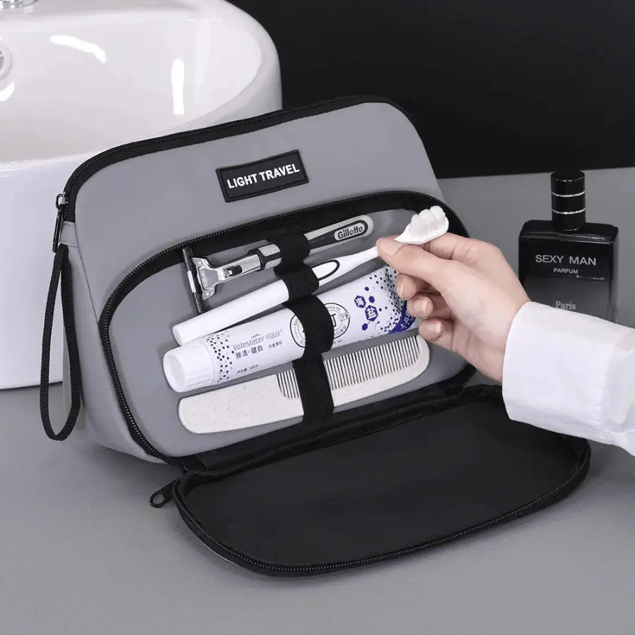 Trousse de toilette avion poche devant avec élastique