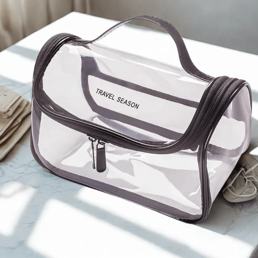 Trousse de toilette avion contour noir intérieur transparent