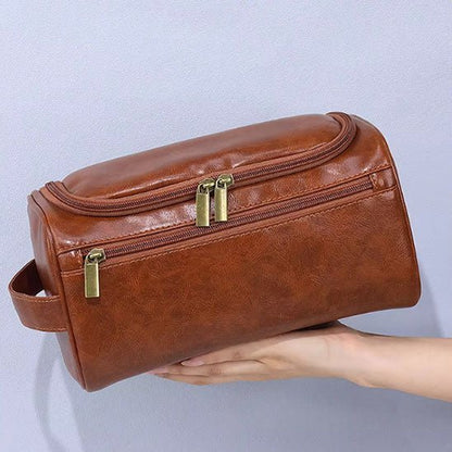 Trousse de Toilette Dans la main d'une femme