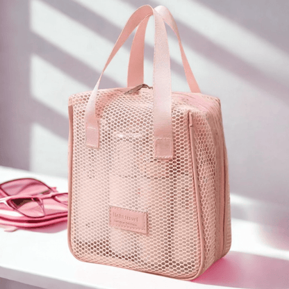 Trousse de toilette de voyage femme rose en maille