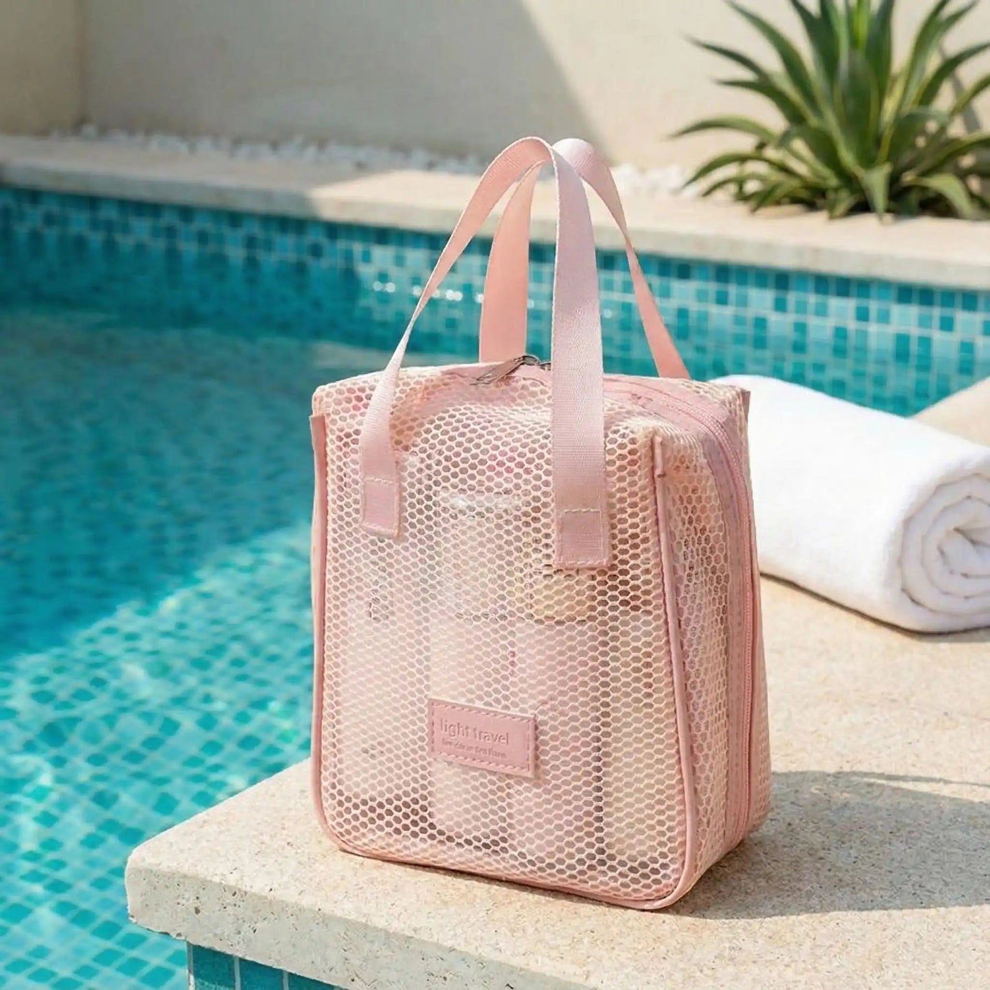 Trousse de toilette de voyage femme rose en maille piscine