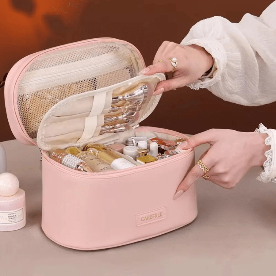 Trousse de toilette femme rose ovale en similicuir