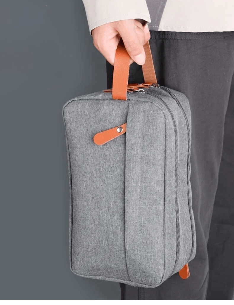 Trousse de toilette  Mix avec une poignée marron en cuir- La trousse Beauté