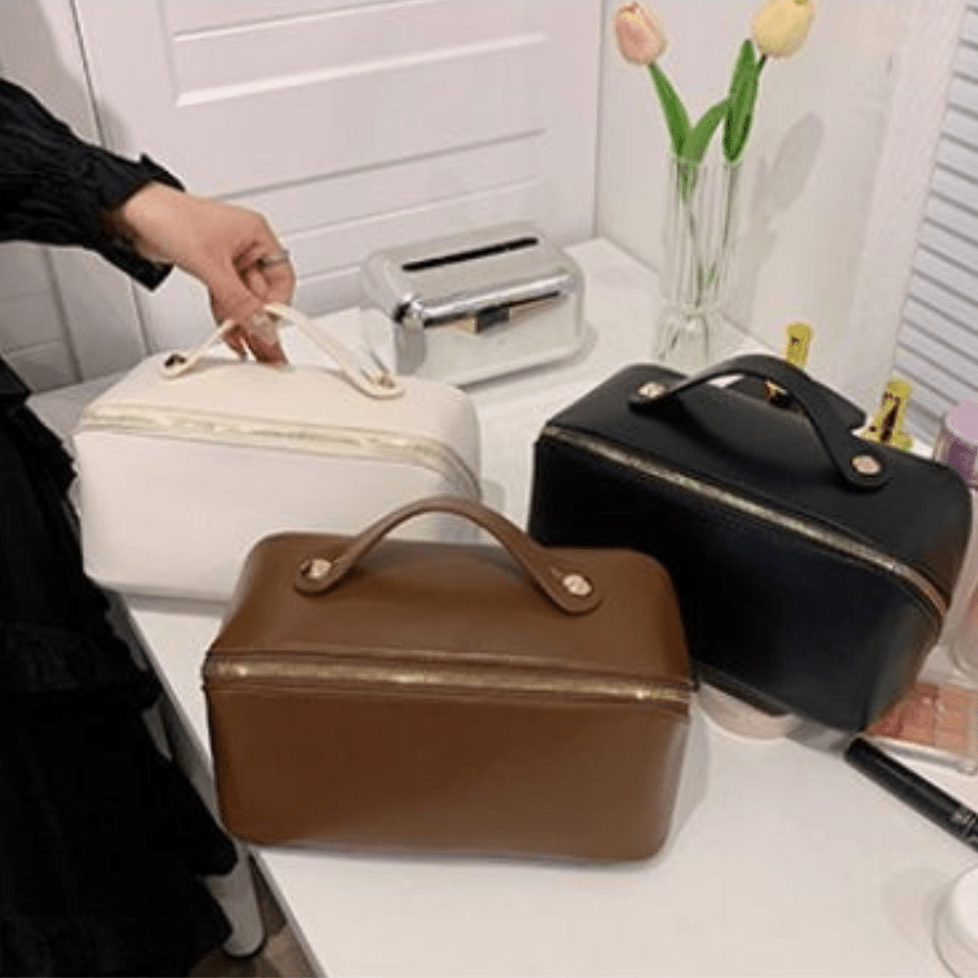trousse de toilette en cuir blanc noir et marron