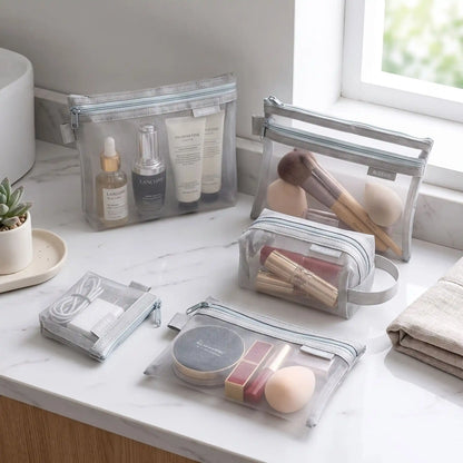 trousse de toilette voyage gris en maille transparente