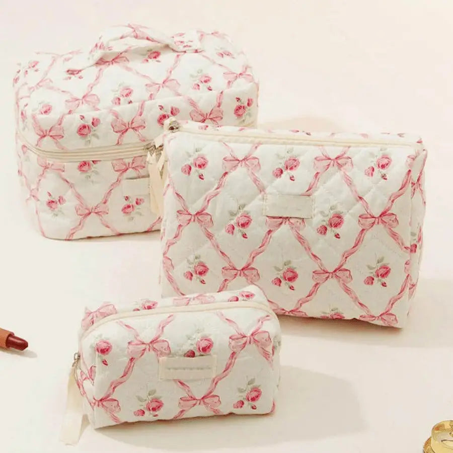Trousses de maquillage trio vintage rose avec des motifs boucles