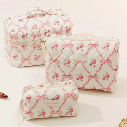 Trousses de maquillage trio vintage rose avec des motifs boucles